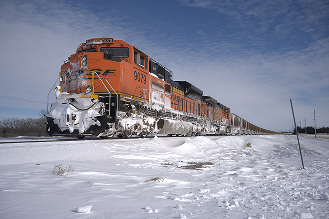 A coal train near Seward, Nebraska, waits for tracks ahead to be cleared.