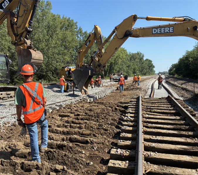 Team members connect hump lead 1 to new lead track at Galesburg. Team members connect hump lead 1 to new lead track at Galesburg.
