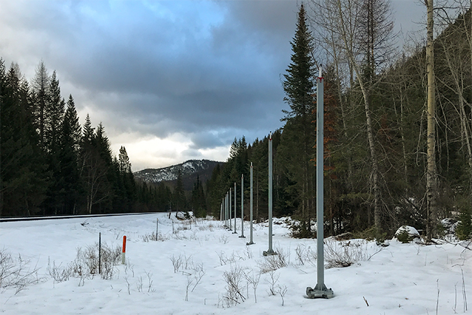 Snow slide detectors generate an alarm when heavy snow tilts the poles.