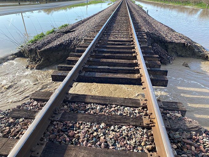 Collapsing tracks with water running underneath the tracks